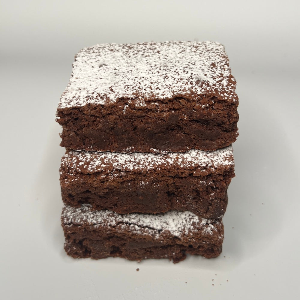 Stacked trio of Lonestar Chocolate Brownies from Pinch of Texas